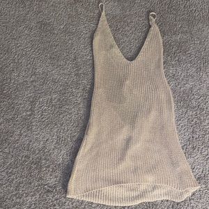 Beautiful crotchet dress/ cover up. True crotchet so it is partially see through